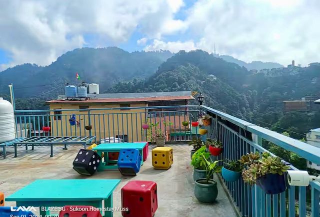 Family Suite 102 - Cozy Family Room for 5 on Mall Road - Terrace with Landour Clock Tower Mountain View